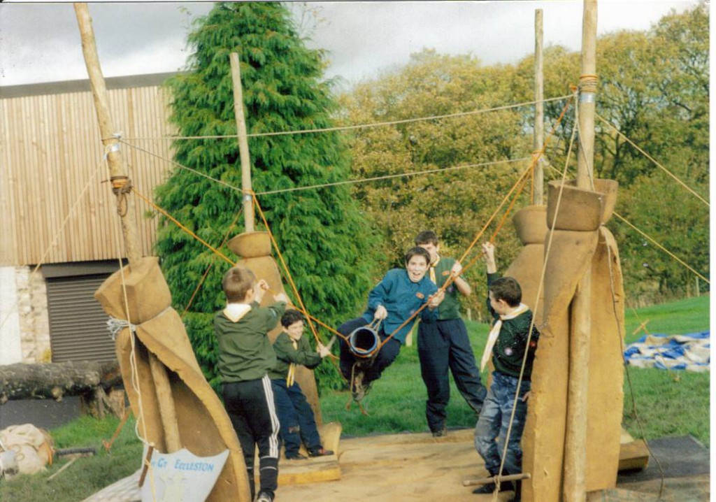 Scouts having fun on a Bucking Bronco built with pioneering poles